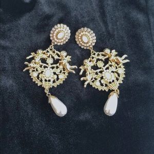 Pearl and diamond statement earrings